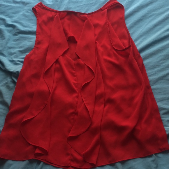 A red short sleeve blouse. - Picture 2 of 2